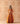 Burnt orange mix print panel lehenga